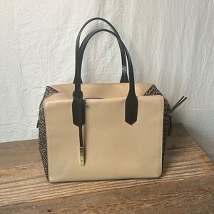 Innue—Chic Beige and Black Satchel with fur accents
